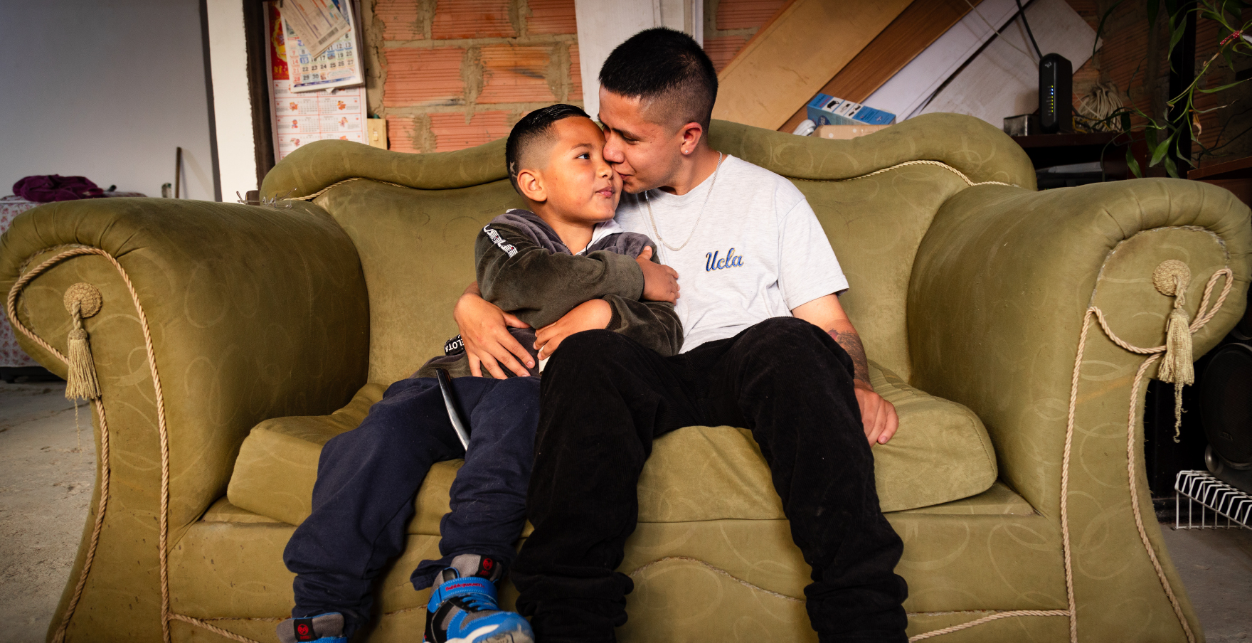 Papá cuidador con su hijo